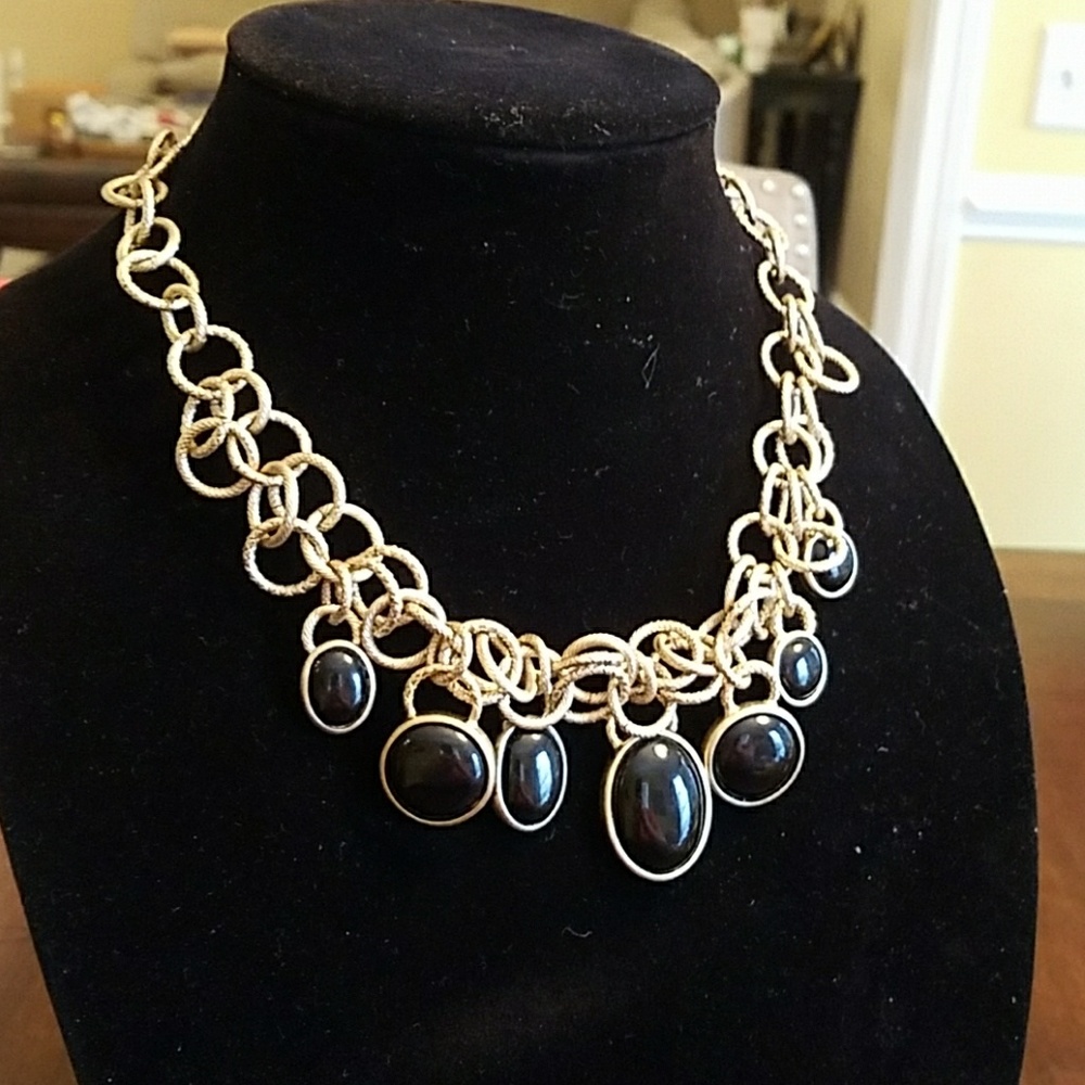 Gold neckless with black stones